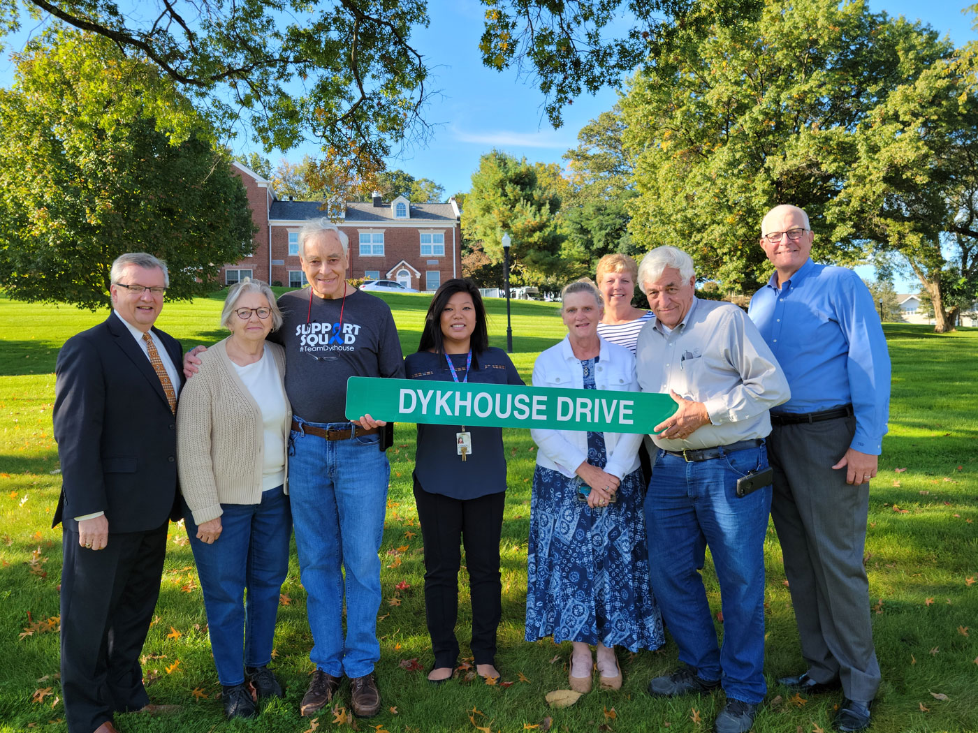 Pictured, left to right: Christian Health CEO Doug Struyk, Barbara Dykhouse (David’s wife), David Dykhouse (Tom’s brother), Kristin Dykhouse Gelenter (Tom and Linda’s daughter), Carole Dykhouse (Larry’s wife), Linda Dykhouse, Larry Dykhouse (Tom’s brother), and Tom Dykhouse